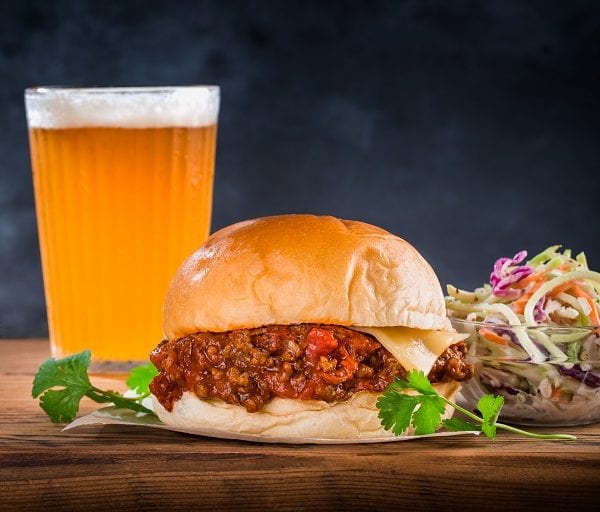 bolognese burger with beer and salad